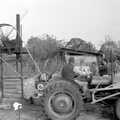 Geoff drives in reverse as the pressing is done, Cider Making in Black and White, Stuston, Suffolk - 11th October 1992