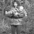 Monique scoops up the baby, Cider Making in Black and White, Stuston, Suffolk - 11th October 1992