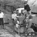 Keith tips in a bucket of apples, Cider Making in Black and White, Stuston, Suffolk - 11th October 1992