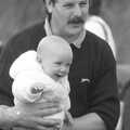 Keith and baby, Cider Making in Black and White, Stuston, Suffolk - 11th October 1992