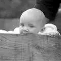 Monique's baby chews on a box, Cider Making in Black and White, Stuston, Suffolk - 11th October 1992