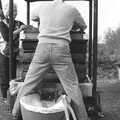 Geoff is astride the juice tank, Cider Making in Black and White, Stuston, Suffolk - 11th October 1992