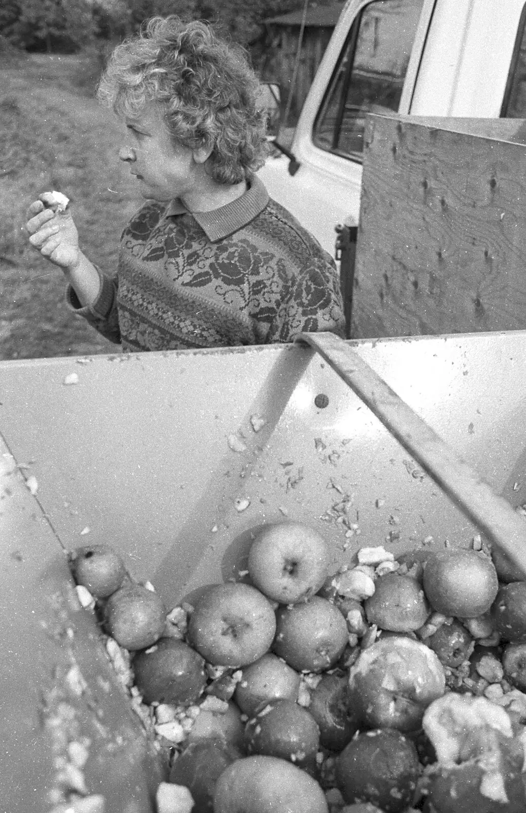 Linda tests the source material, from Cider Making in Black and White, Stuston, Suffolk - 11th October 1992