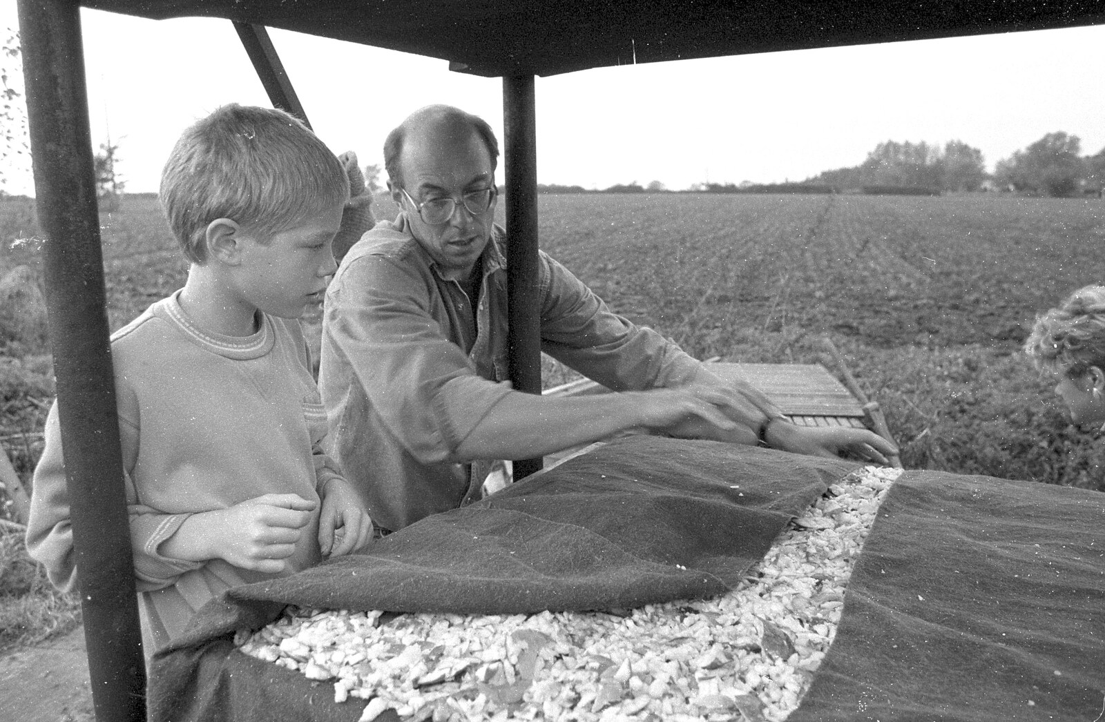 John and George wrap up a cheese from Cider Making in Black and White, Stuston, Suffolk - 11th October 1992