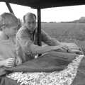 John and George wrap up a cheese, Cider Making in Black and White, Stuston, Suffolk - 11th October 1992