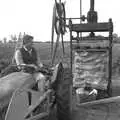 Winnie is strapped up to the press, Cider Making in Black and White, Stuston, Suffolk - 11th October 1992