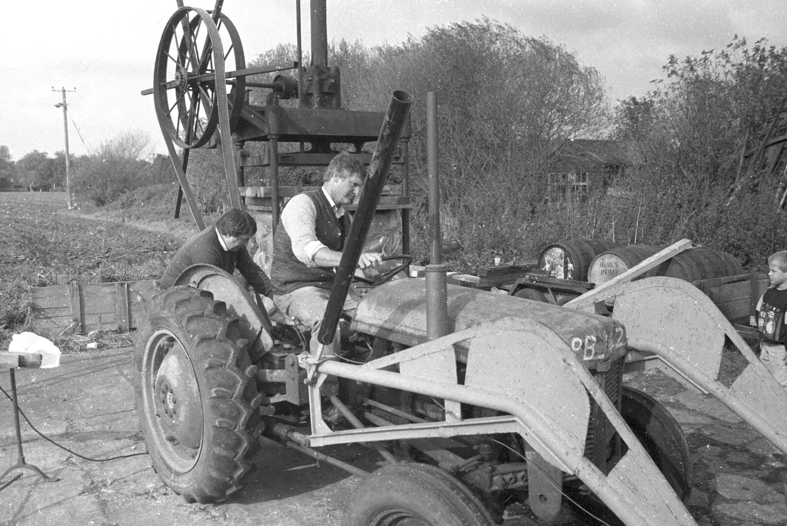 Geoff fires up Winnie the TE-120, from Cider Making in Black and White, Stuston, Suffolk - 11th October 1992