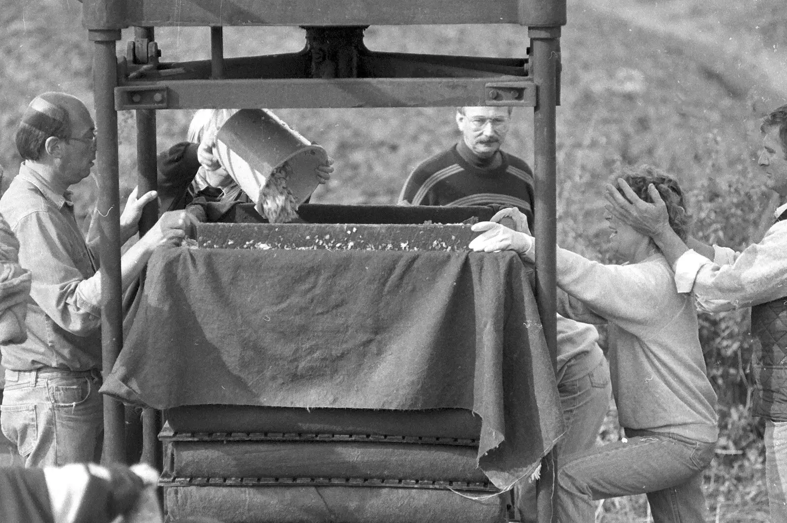 Geoff 'helps' Brenda, from Cider Making in Black and White, Stuston, Suffolk - 11th October 1992