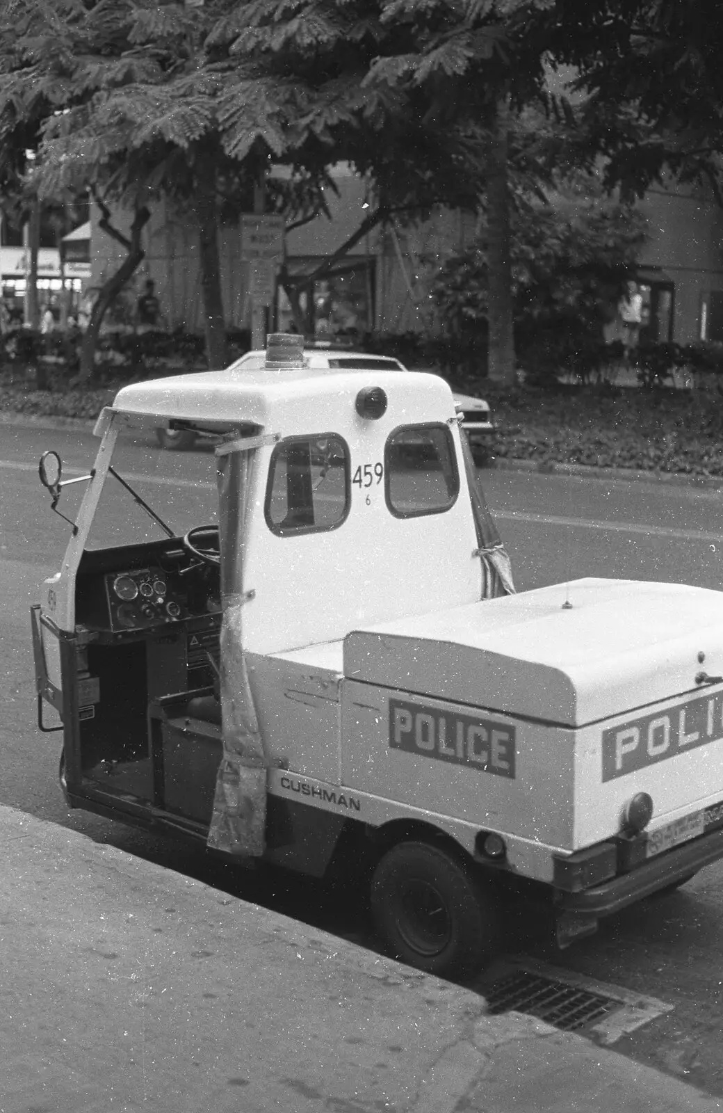 A tiny Honolulan police vehicle, from A 747 Cockpit, Honolulu and Pearl Harbor, O'ahu, Hawai'i, United States - 20th November 1992