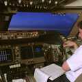 The co-pilot does paperwork at 35,000 feet, heading west, A 747 Cockpit, Honolulu and Pearl Harbor, O'ahu, Hawai'i, United States - 20th November 1992