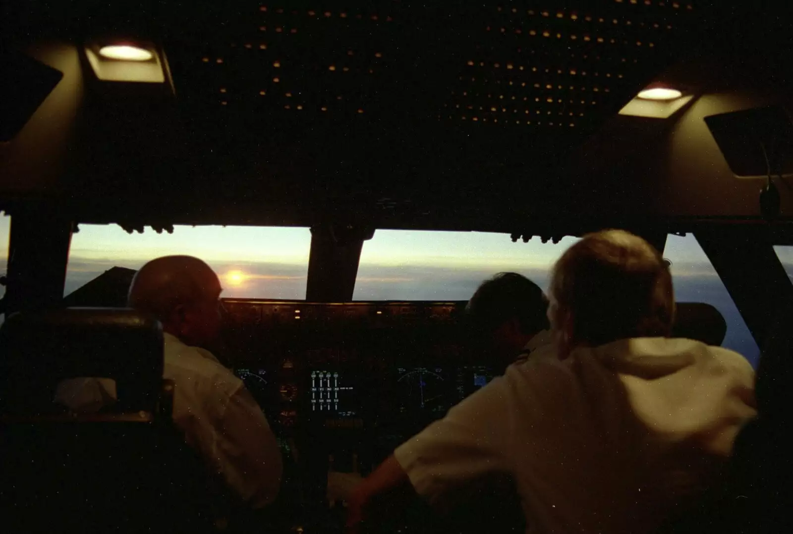 The sun rises briefly as we chase the terminator, from A 747 Cockpit, Honolulu and Pearl Harbor, O'ahu, Hawai'i, United States - 20th November 1992