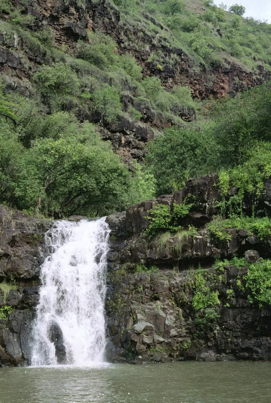 A waterfall, from A 747 Cockpit, Honolulu and Pearl Harbor, O'ahu, Hawai'i, United States - 20th November 1992