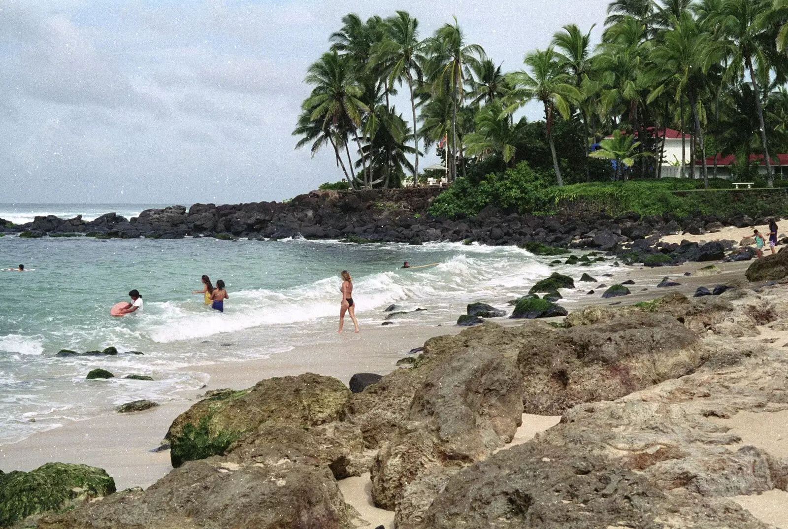 Surfers and swimmers on North Shore, from A 747 Cockpit, Honolulu and Pearl Harbor, O'ahu, Hawai'i, United States - 20th November 1992