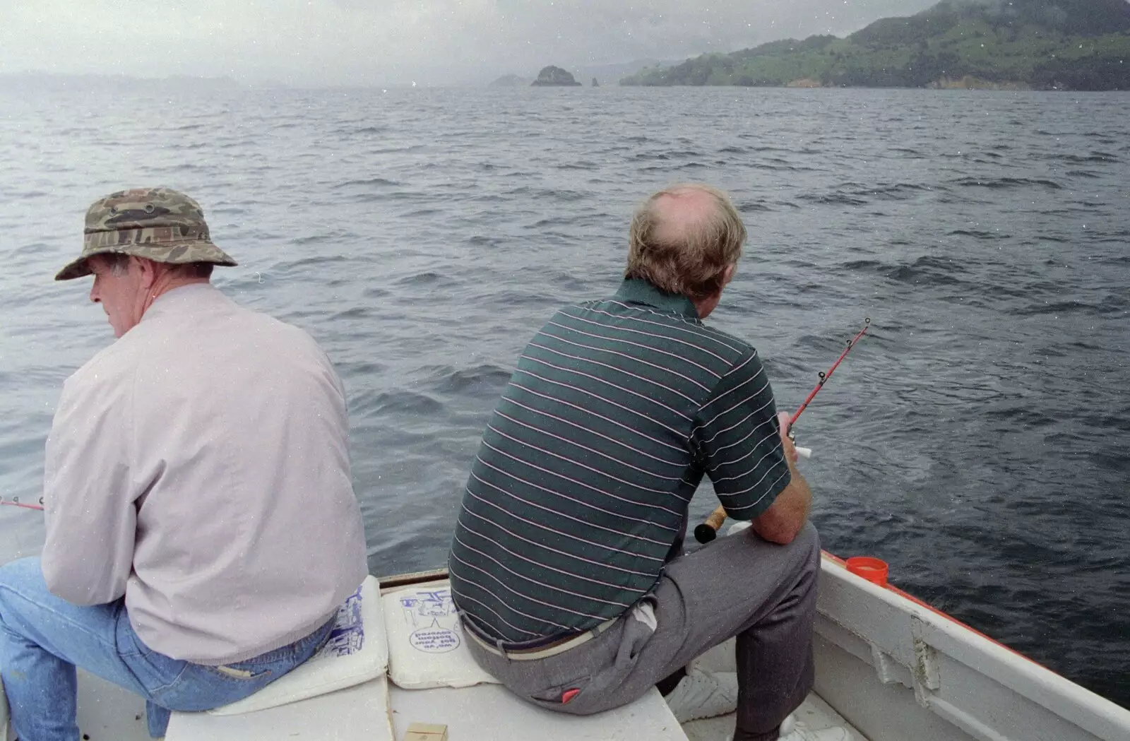 Clive and Trevor at the stern of the boat, from Ferry Landing, Whitianga, New Zealand - 23rd November 1992