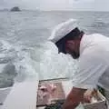 The skipper chops some fish up, Ferry Landing, Whitianga, New Zealand - 23rd November 1992