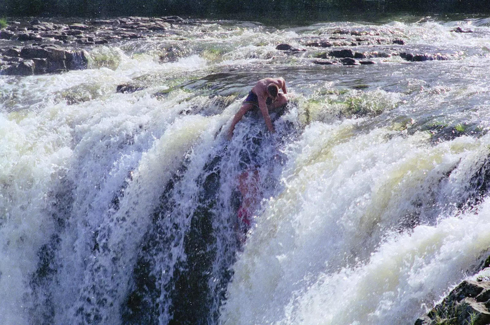 A couple of boys mess around in a waterfall, from The Bay Of Islands, New Zealand - 29th November 1992