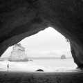 People mill around in Cathedral Cove