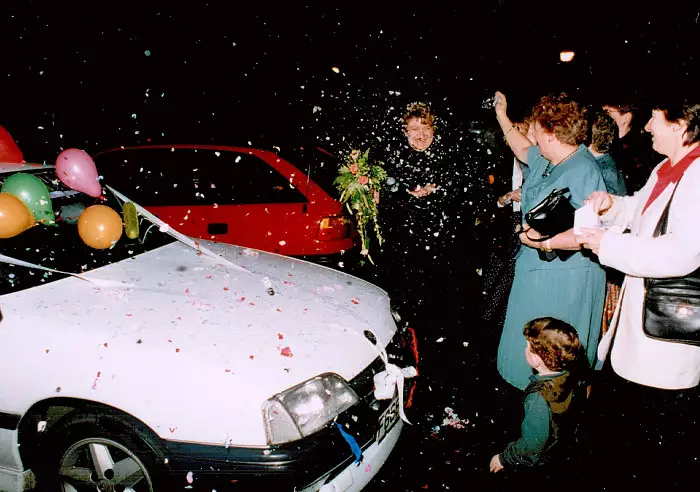 Confetti is hurled as Anna and Chris leave, from Anna and Chris's Wedding, Southampton - December 1992