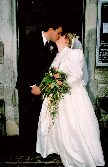 A kiss on the steps of the church, from Anna and Chris's Wedding, Southampton - December 1992