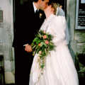 A kiss on the steps of the church, Anna and Chris's Wedding, Southampton - December 1992