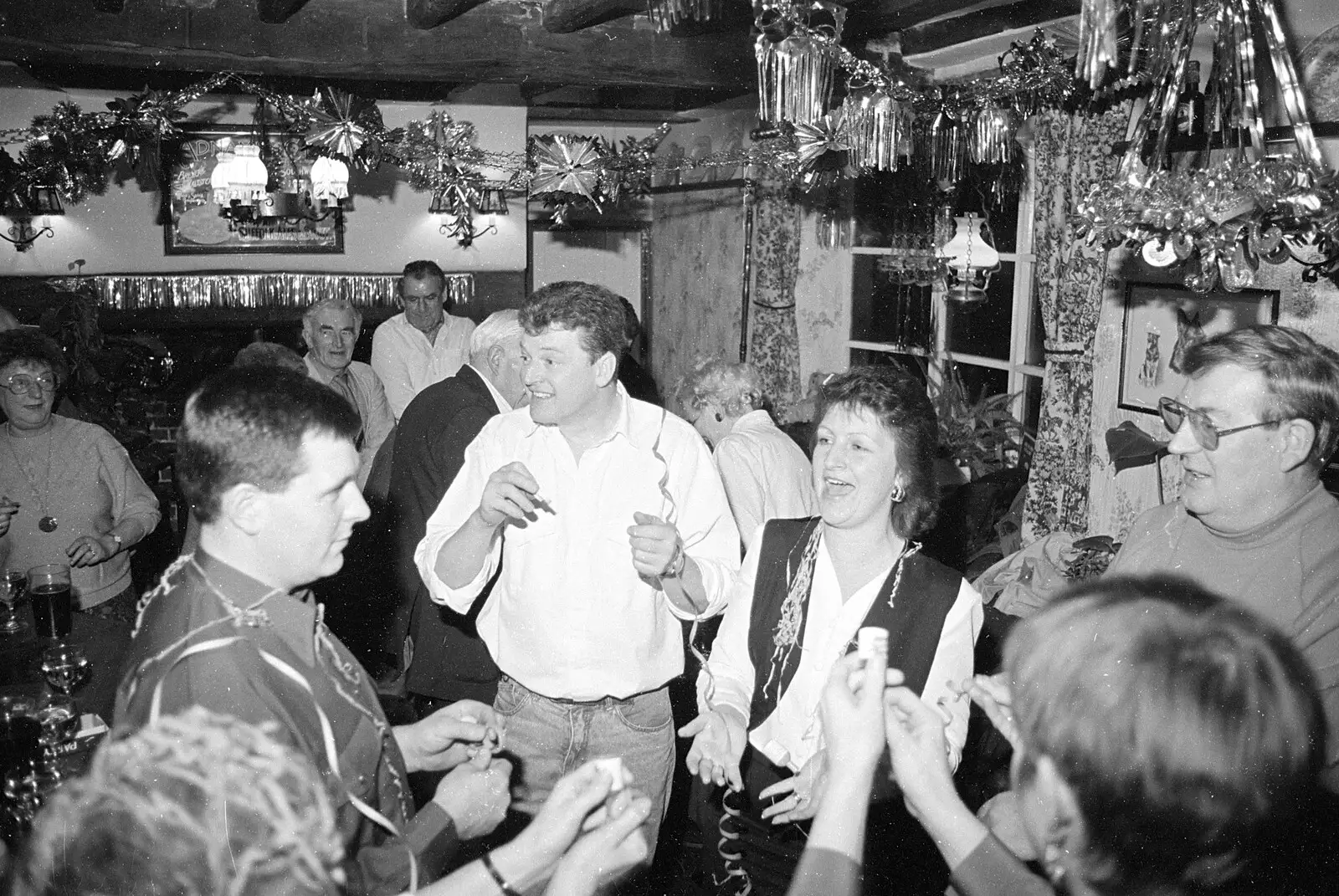 Party poppers are pulled, from New Year's Eve at the Swan Inn, Brome, Suffolk - 31st December 1992