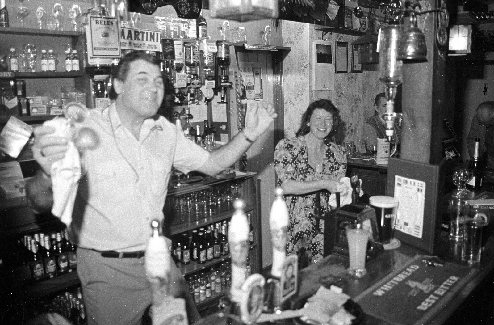 Alan dances behind the bar from New Year's Eve at the Swan Inn, Brome, Suffolk - 31st December 1992