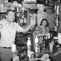 Alan dances behind the bar, New Year's Eve at the Swan Inn, Brome, Suffolk - 31st December 1992