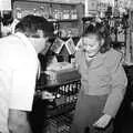 Alan and Claire dance behind the bar, New Year's Eve at the Swan Inn, Brome, Suffolk - 31st December 1992