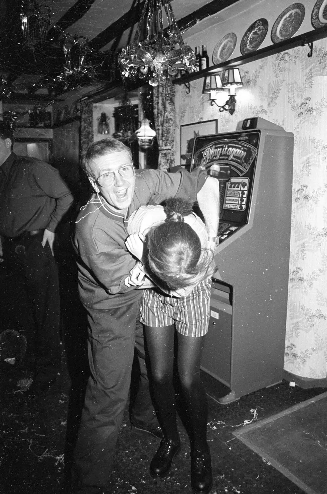 John Willy has a wrestle with Lorraine, from New Year's Eve at the Swan Inn, Brome, Suffolk - 31st December 1992