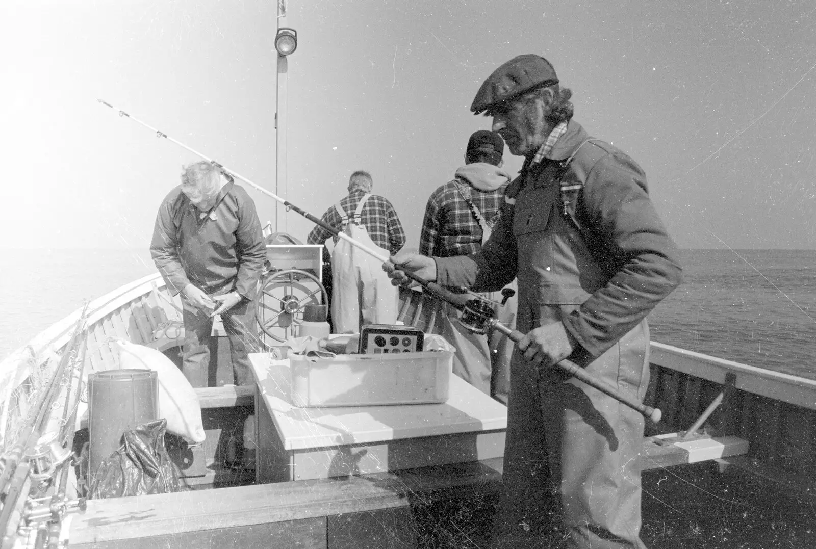 Fishy Peter gets a fishing rod out, from A Fishing Trip on the Linda M, Southwold, Suffolk - 25th April 1993