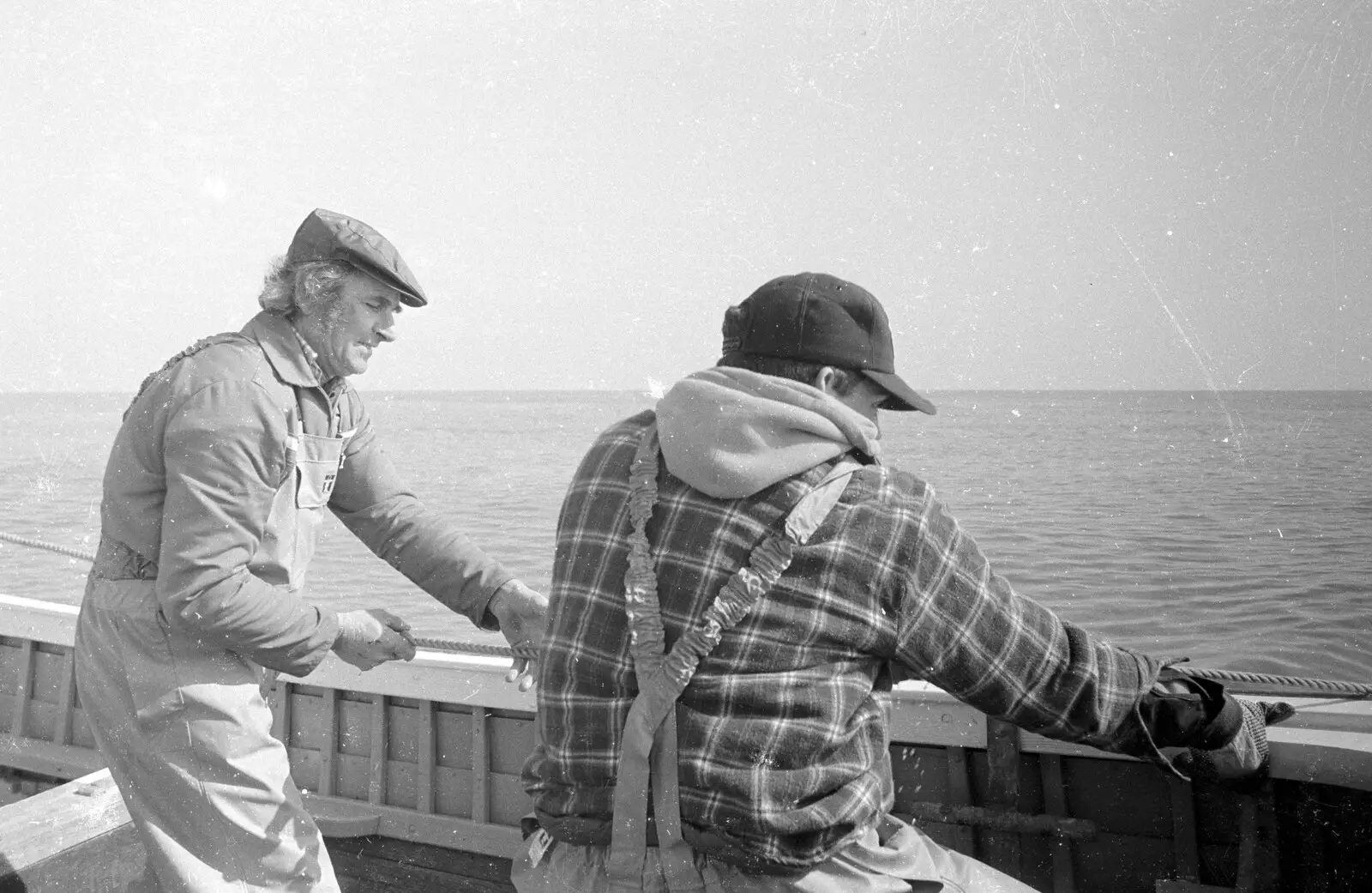 Peter and Ben start to haul the nets in, from A Fishing Trip on the Linda M, Southwold, Suffolk - 25th April 1993