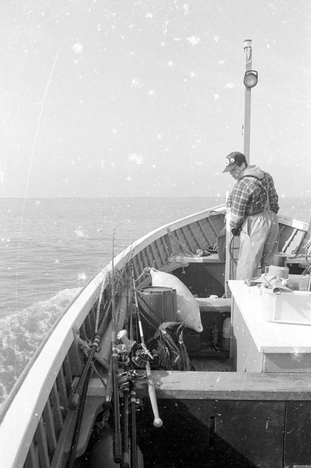 Ben takes the wheel for a while, from A Fishing Trip on the Linda M, Southwold, Suffolk - 25th April 1993