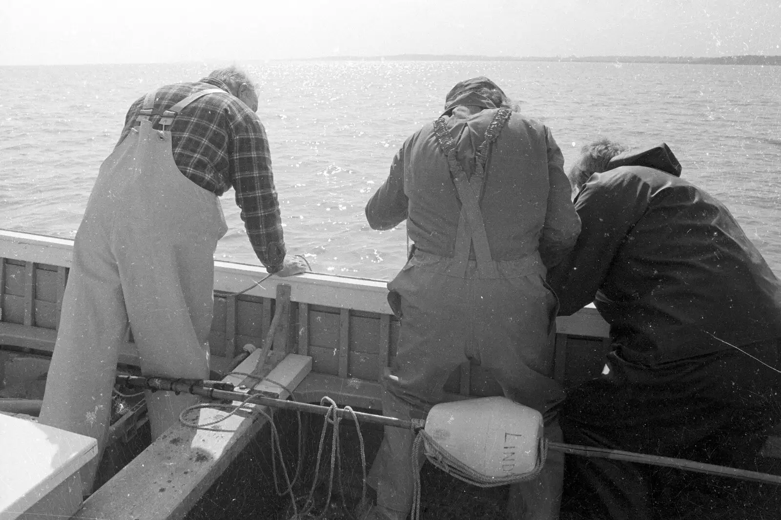 The fishermen look at the nets, from A Fishing Trip on the Linda M, Southwold, Suffolk - 25th April 1993