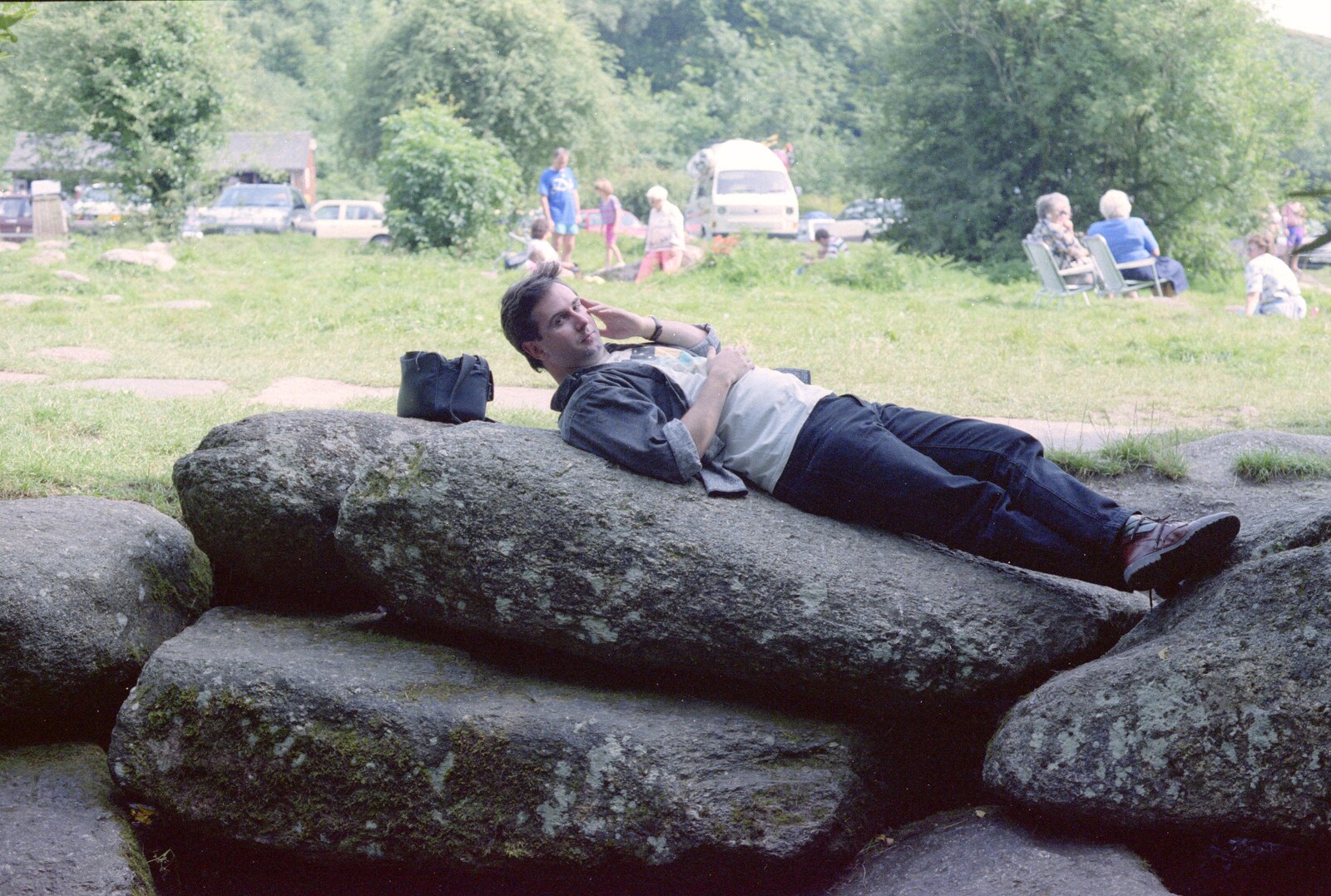 Riki lies on a rock at Badger's Holt from A Trip to Mutton Cove, Plymouth, Devon - 15th May 1993