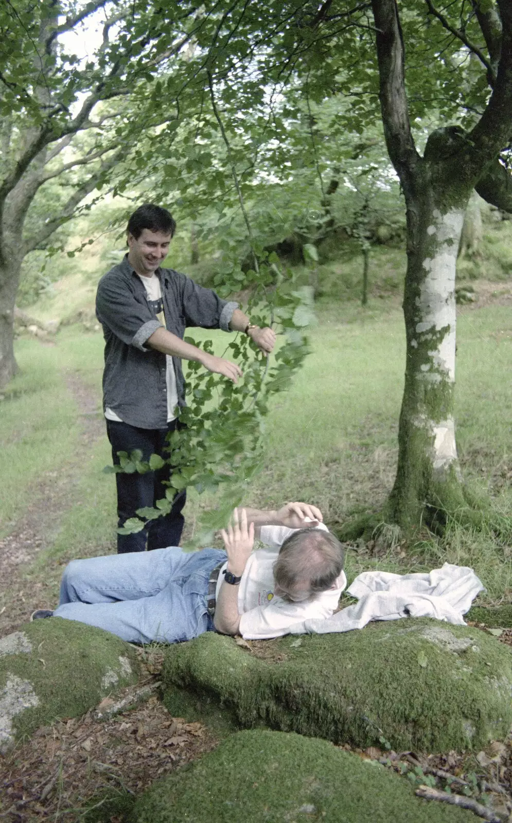 Rik's found a bit of tree to poke Dave with, from A Trip to Mutton Cove, Plymouth, Devon - 15th May 1993