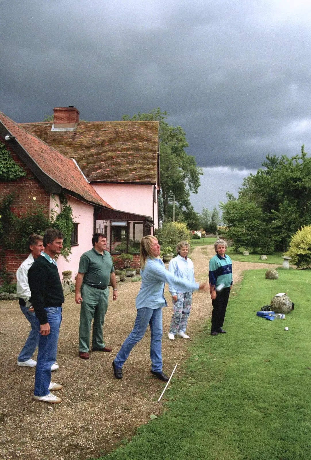 Sue hurls a shoe, from Mel Visits and a bit of Clays, Stuston and Bungay, Suffolk - 19th June 1993