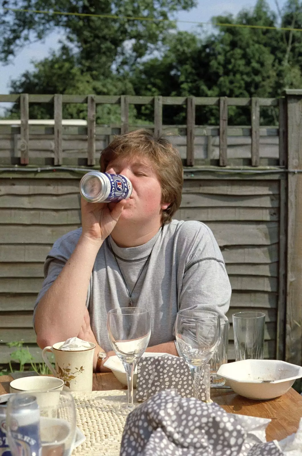 Sis slurps on Fosters, from Mel Visits and a bit of Clays, Stuston and Bungay, Suffolk - 19th June 1993