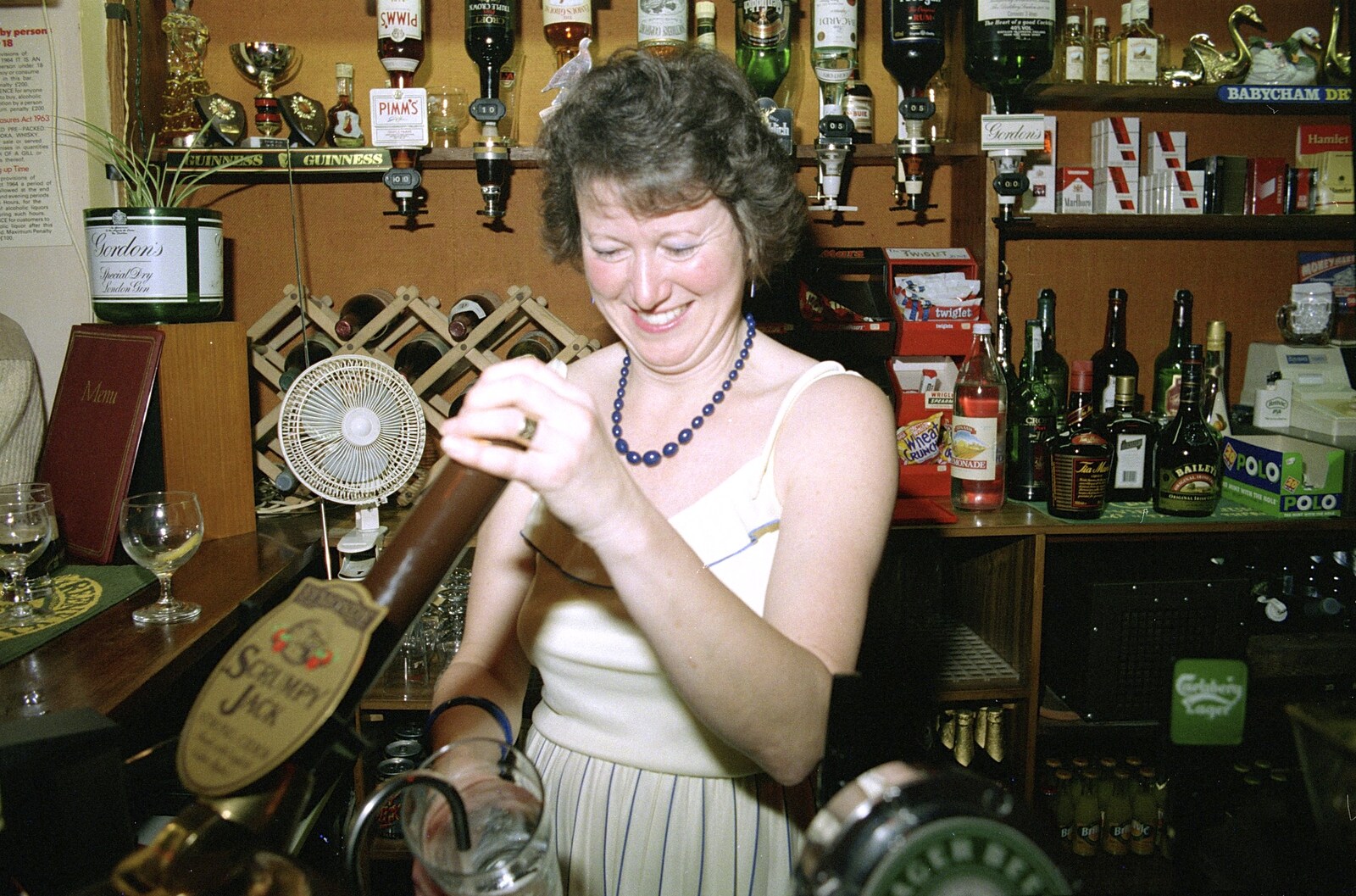 Sylvia pulls a pint of Scrumpy Jack from A Night In The Swan Inn, Brome, Suffolk - 1st November 1993