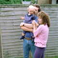 Monique and Keith with their sprog, A Geoff and Brenda Barbeque, Stuston, Suffolk - 3rd April 1994
