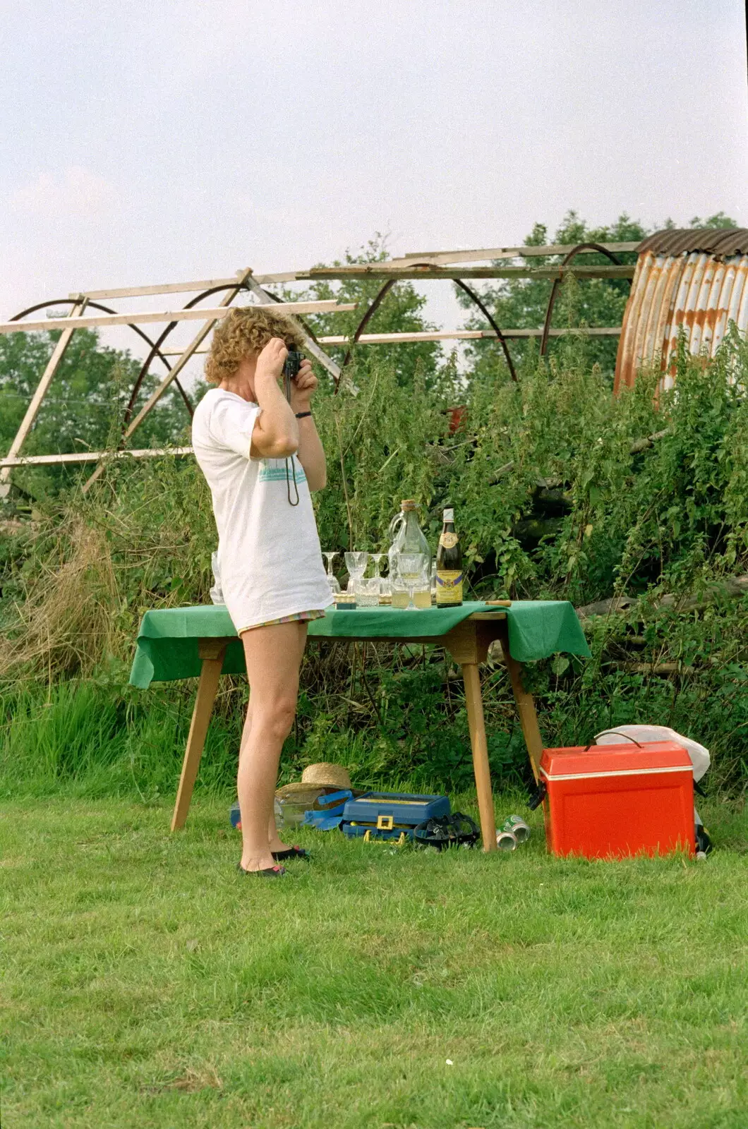 Brenda takes a photo, from A Geoff and Brenda Barbeque, Stuston, Suffolk - 3rd April 1994