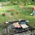 Bernie warily scopes out the sausages, A Geoff and Brenda Barbeque, Stuston, Suffolk - 3rd April 1994