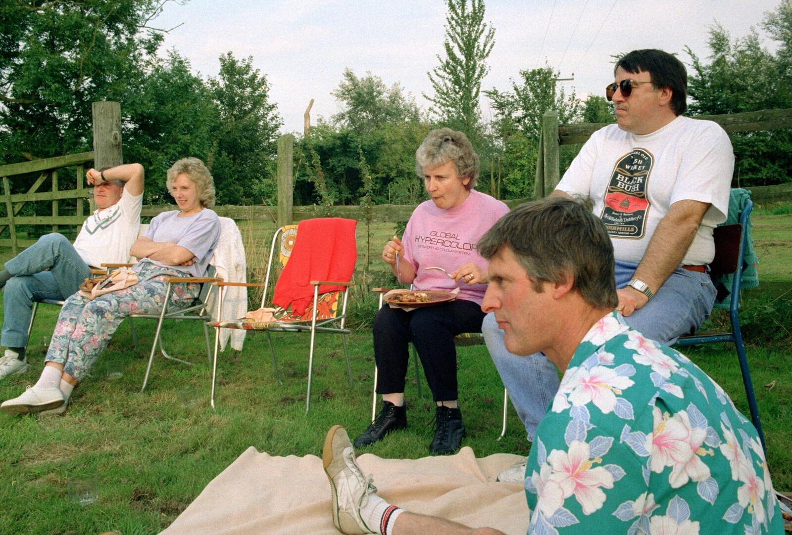 The gang sit around from A Geoff and Brenda Barbeque, Stuston, Suffolk - 3rd April 1994