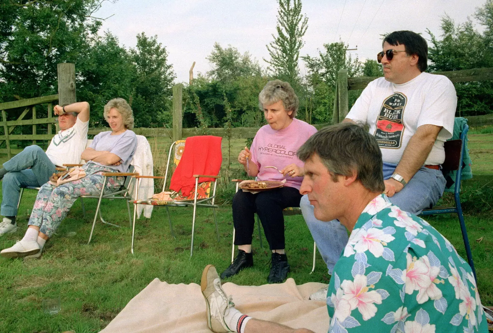 The gang sit around, from A Geoff and Brenda Barbeque, Stuston, Suffolk - 3rd April 1994