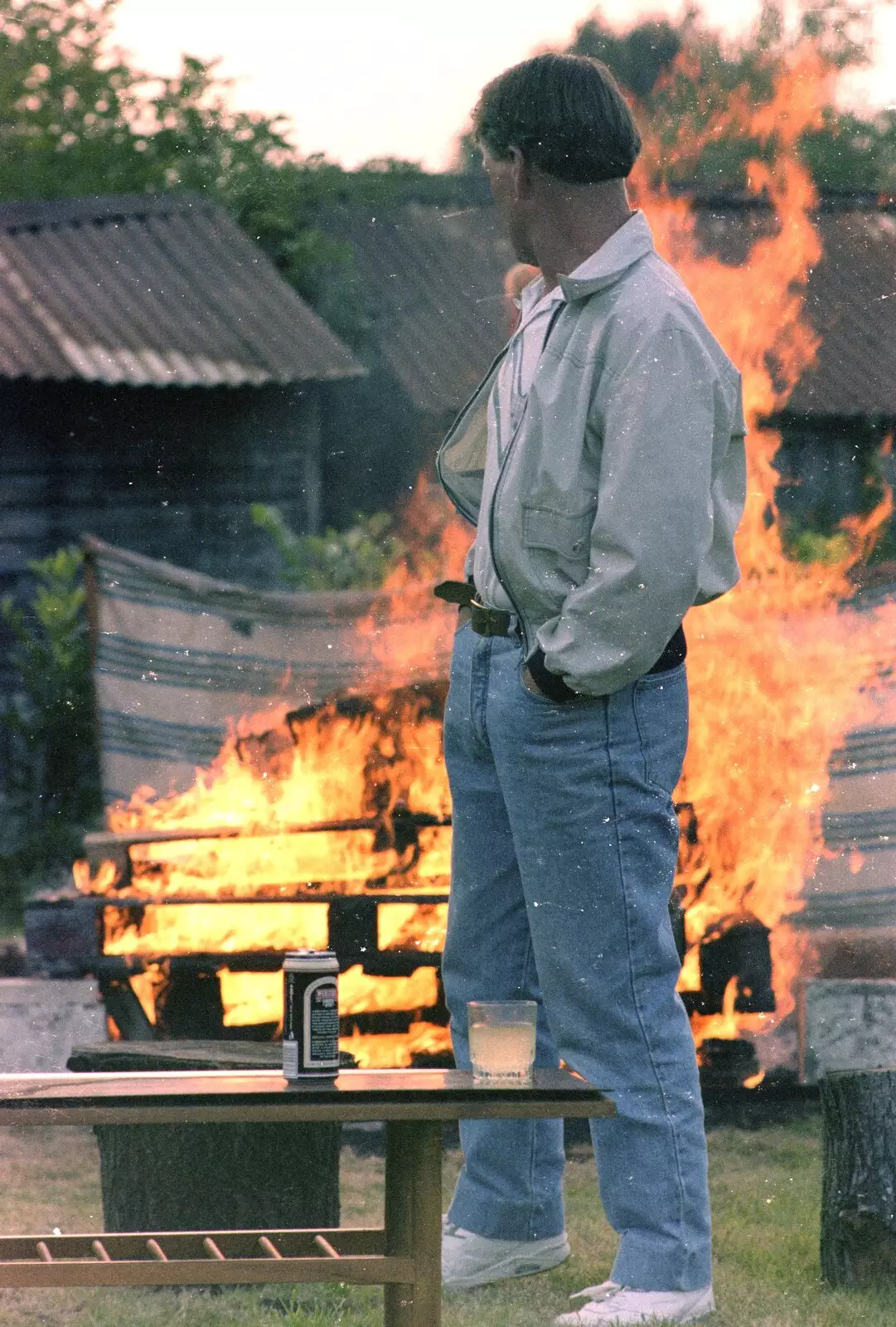 Bernie considers the towering inferno of pallets, from A Geoff and Brenda Barbeque, Stuston, Suffolk - 3rd April 1994