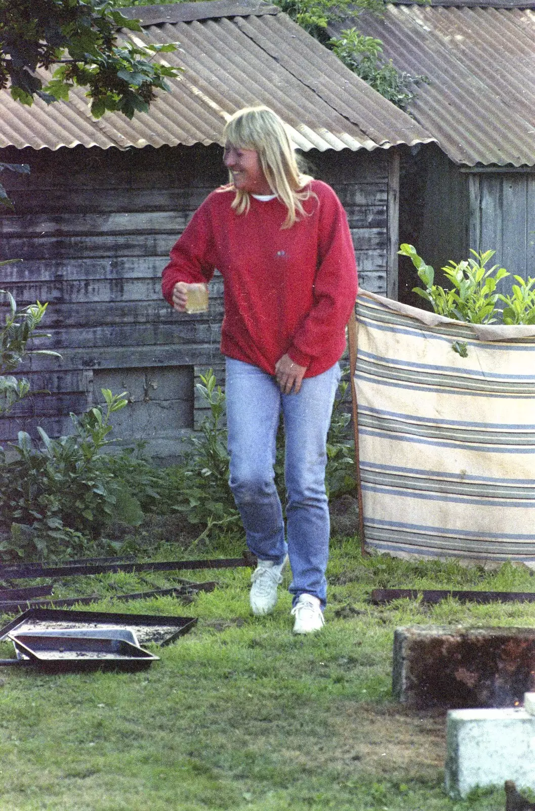 Mad Sue runs around with a cider in hand, from A Geoff and Brenda Barbeque, Stuston, Suffolk - 3rd April 1994