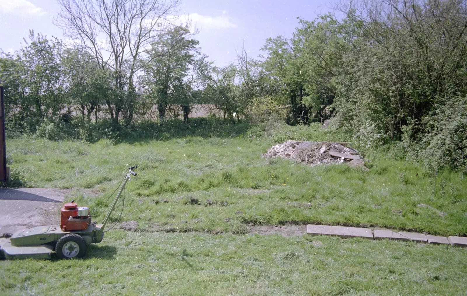 The hired grass cutter waits to do its thing, from A Clays Trip to Calais, and Sorting Out The Garden, Suffolk - 18th May 1994