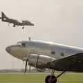 The Harrier flies past a taxiing C-47, The Mildenhall Air Fete, Mildenhall, Suffolk - 29th May 1994