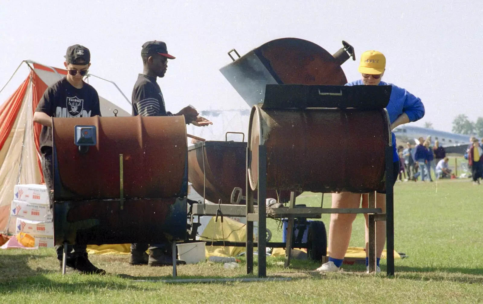 The boys from the base cook up some burgers, from The Mildenhall Air Fete, Mildenhall, Suffolk - 29th May 1994