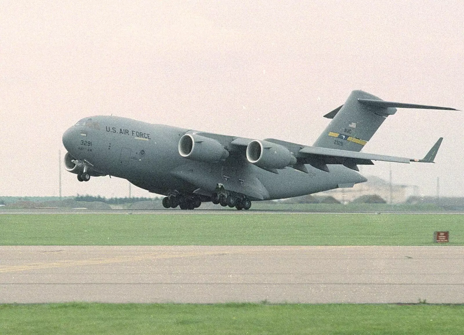 A Starlifter takes off, from The Mildenhall Air Fete, Mildenhall, Suffolk - 29th May 1994