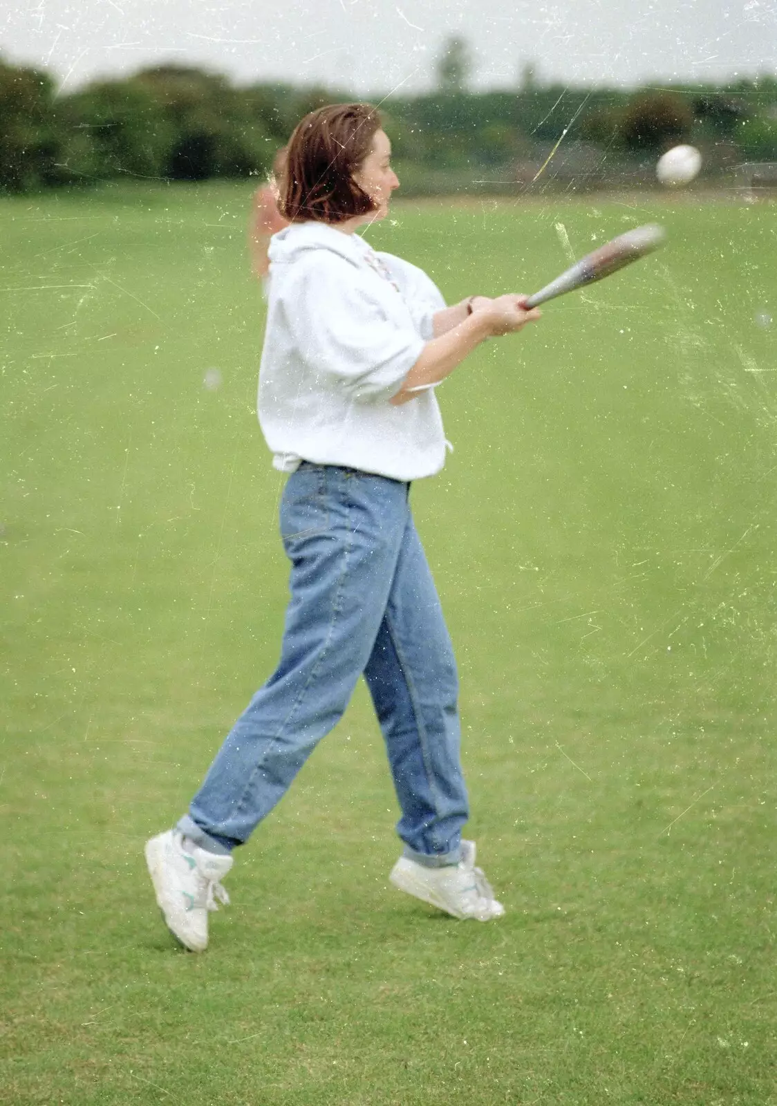 Jo has another swing, from Clays Softball and Printec Reunion, Ditchingham and Stoke Ash, Suffolk - 2nd June 1994